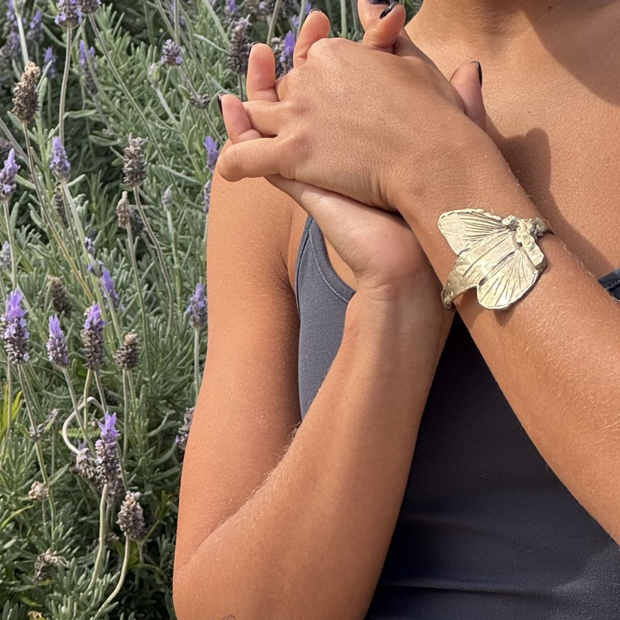Sof Atelier butterfly cuff, worn in lavender