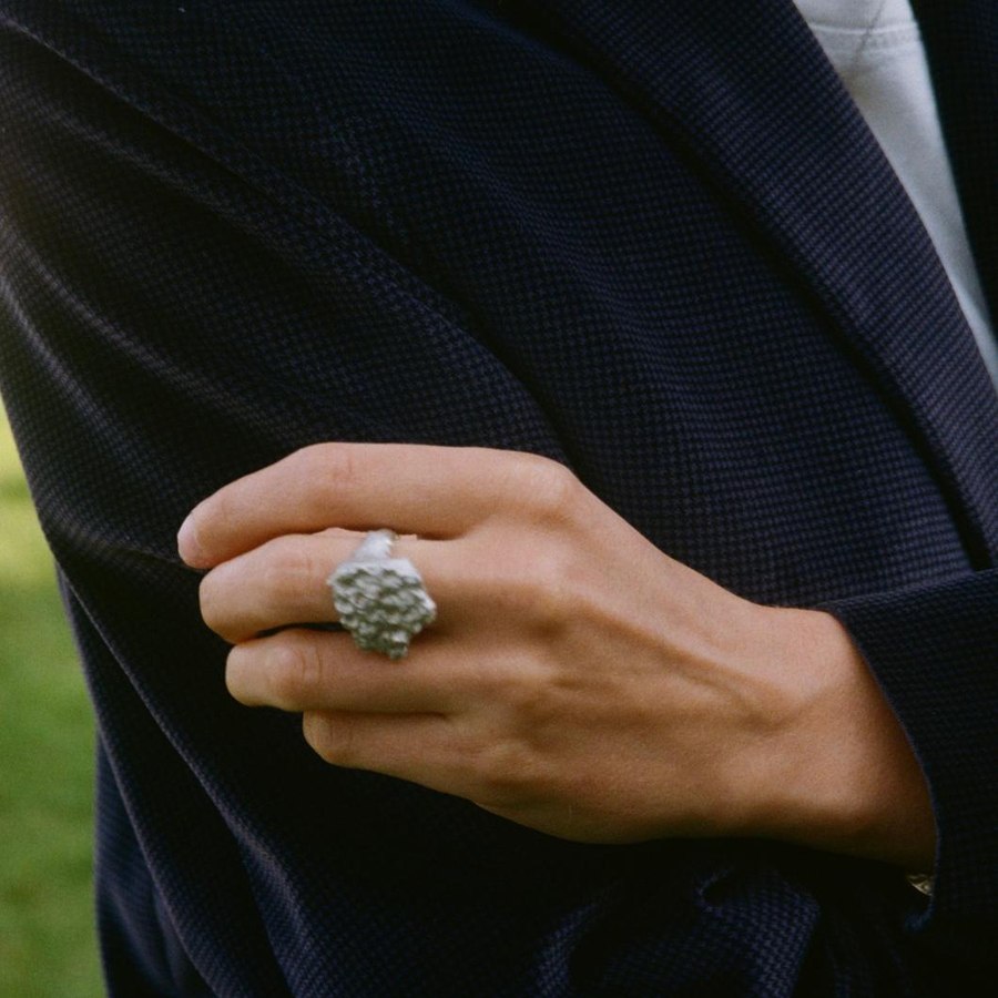 Sof Atelier ring and bracelet, worn on grass