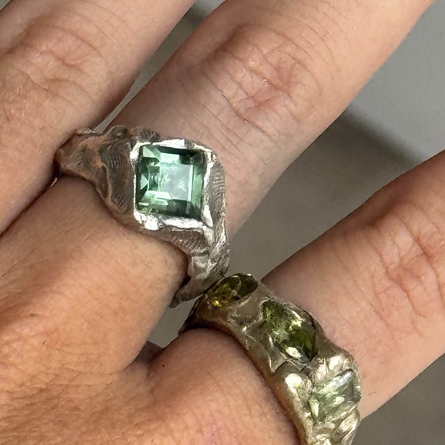Sof Atelier rings, worn on two hands